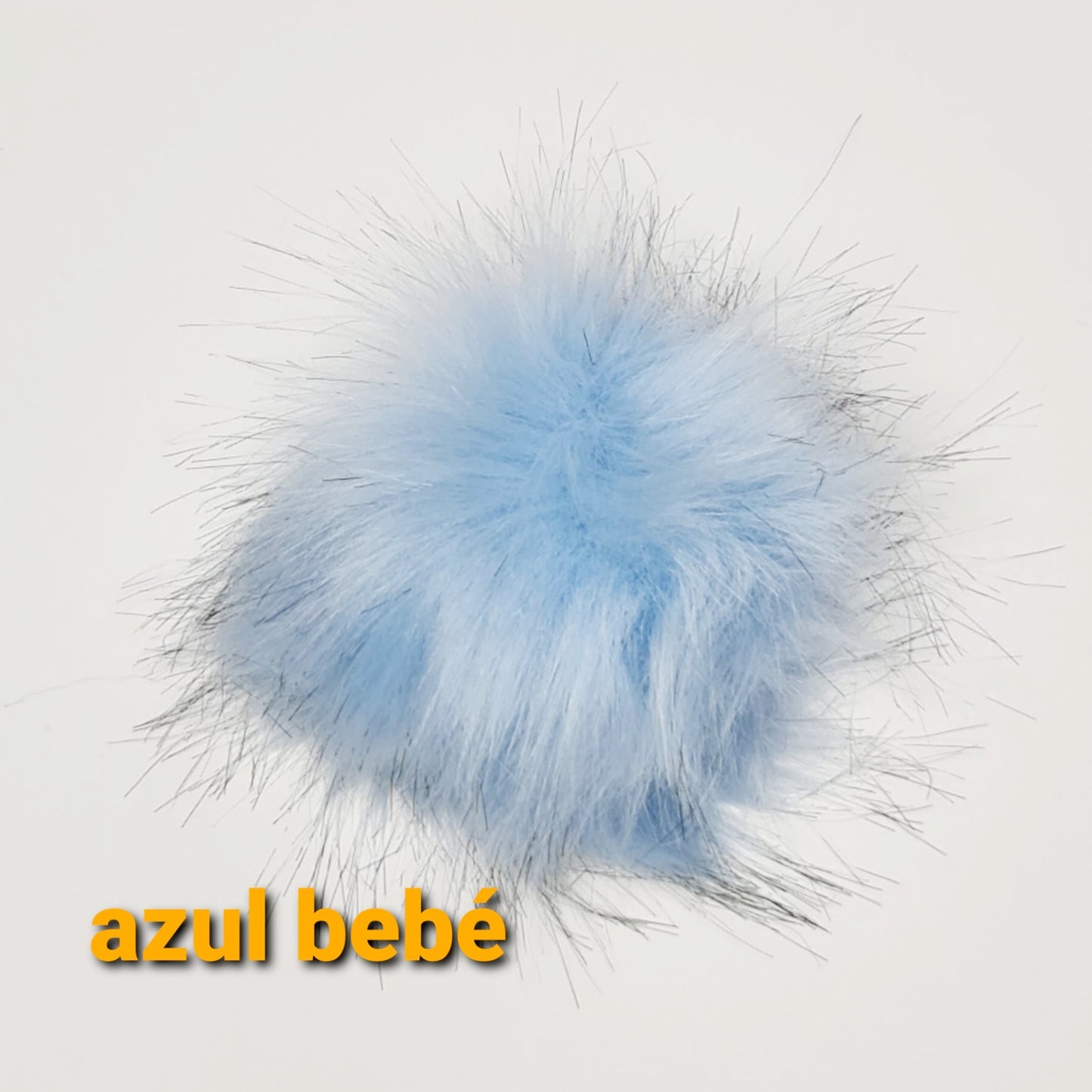 Pompones adicionales