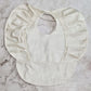 babero impermeable con olanes